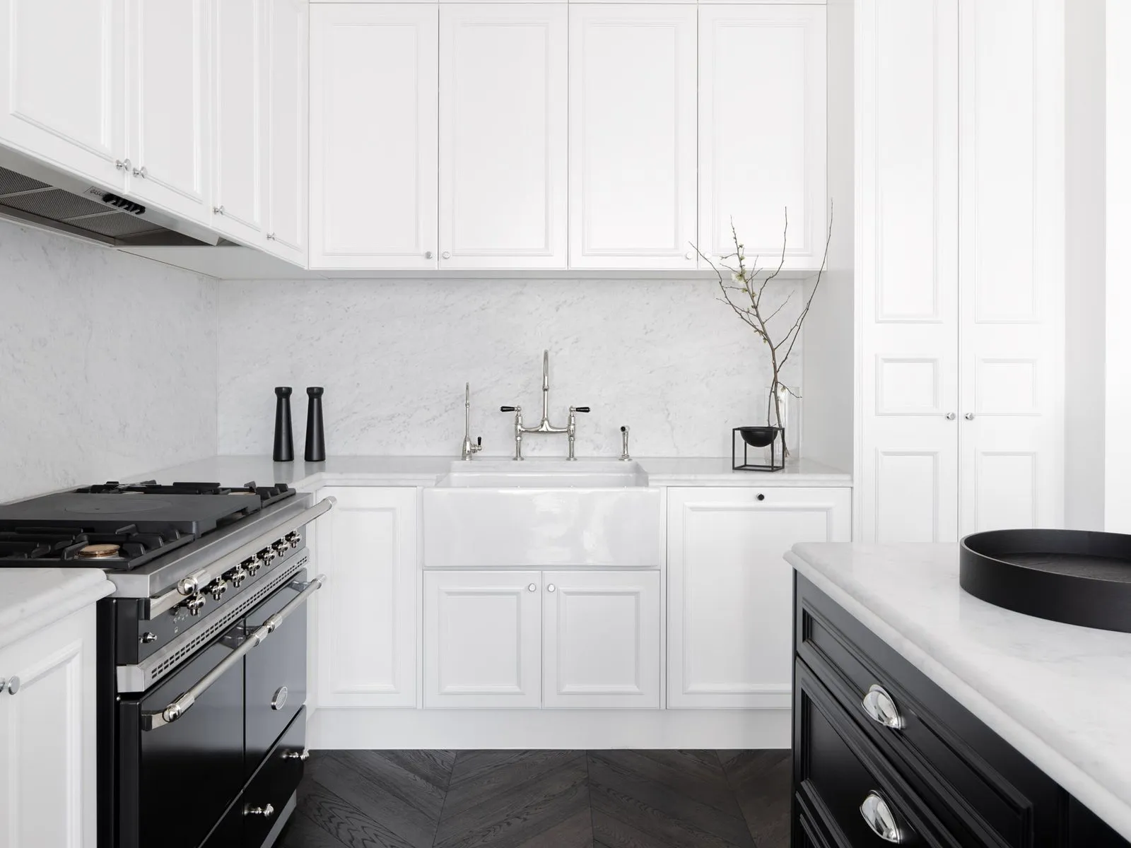 Modern white kitchen with slim shaker cabinets from the Vamaylo Metro collection