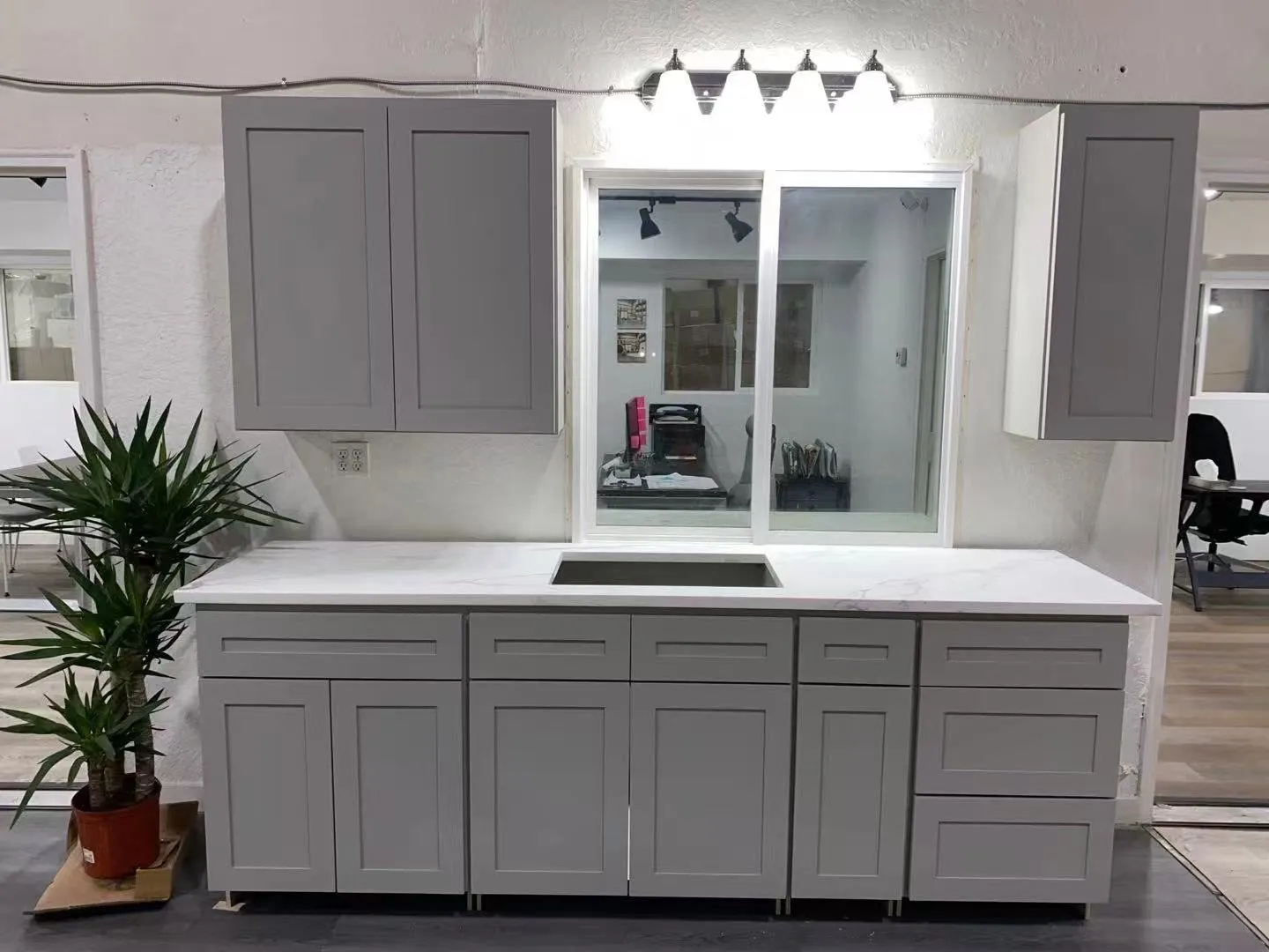 White entryway built-in storage cabinetry by Vamaylo